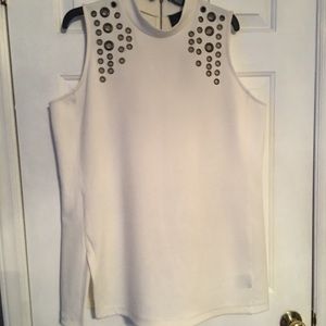 Beautiful sleeveless top with grommets.